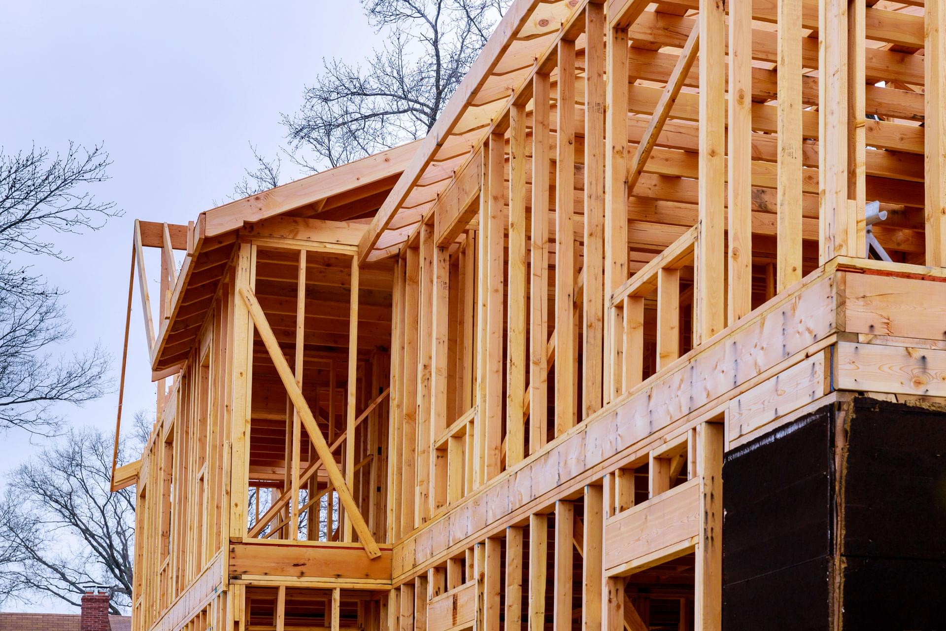 abstract wood home framing construction site
