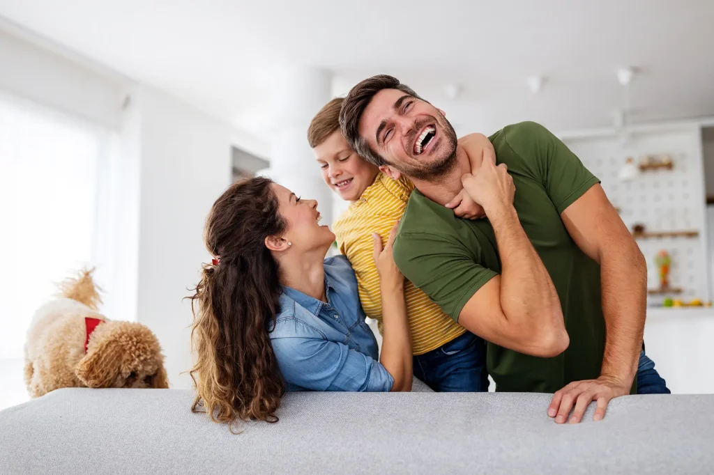 happy family having fun time home together web