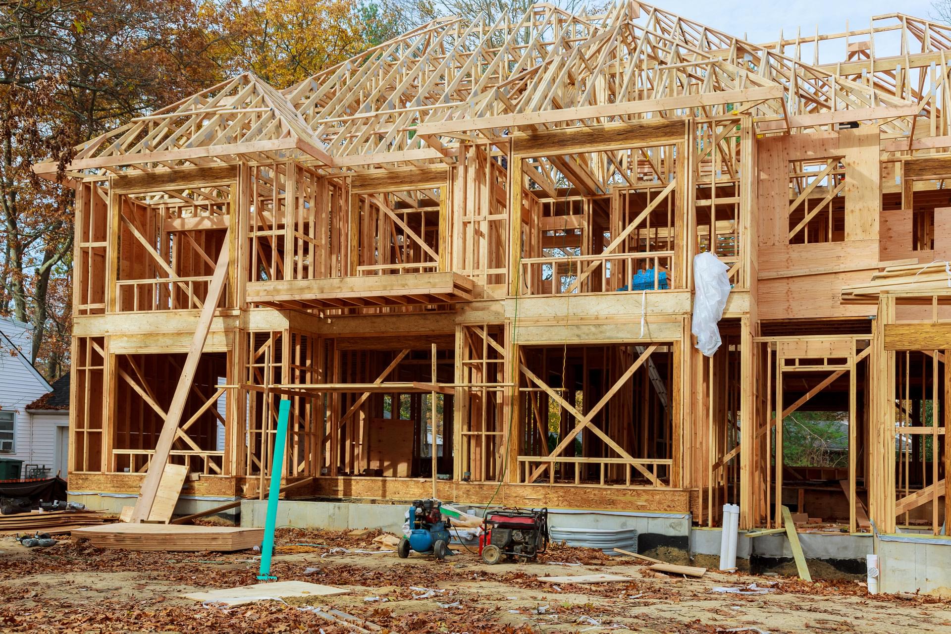 single family home construction building new wood framed house