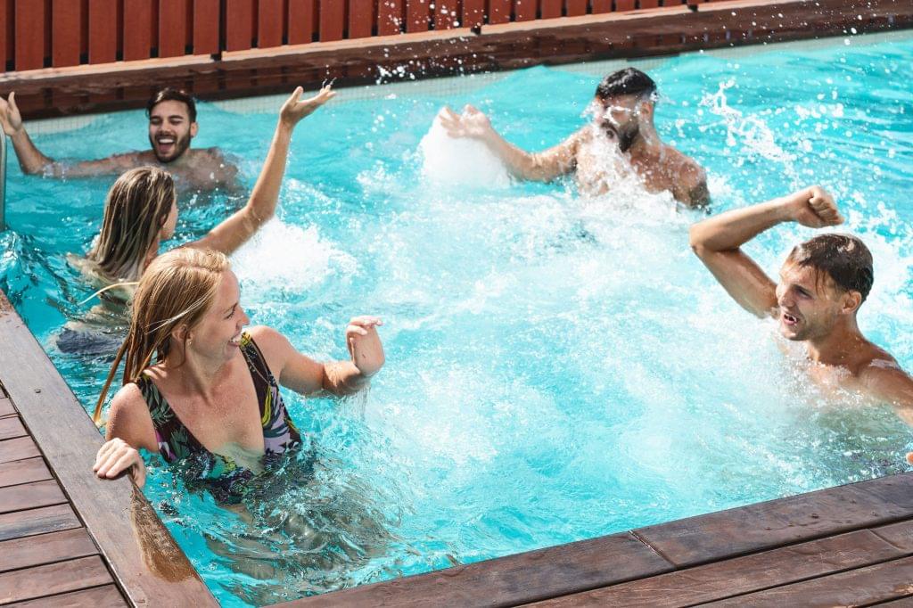 young people having fun in exclusive pool party